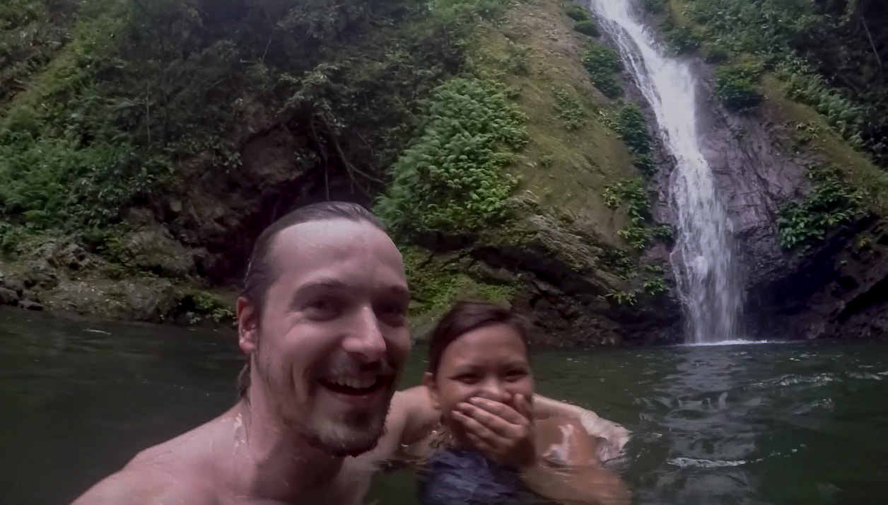 lenny through paradise and melody somido enjoying the water at kabigan falls in pagudpud ilocos norte philippines